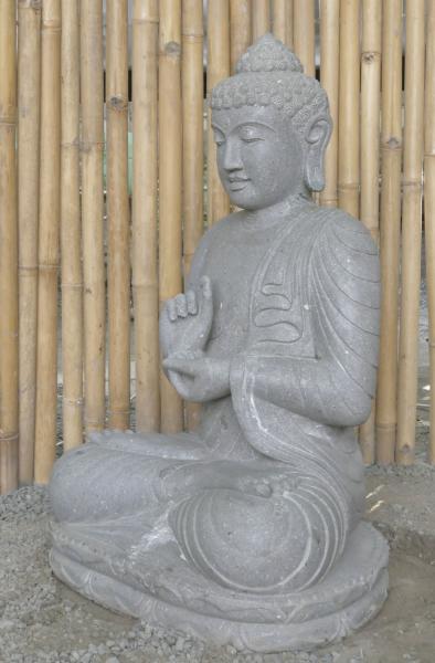 Product image 8 of the product “Seated Buddha made of Riverstone in Dharmachakra gesture of wheel of the teaching of the Dharma, H. 83cm. There is a stone eye on the left shoulder. ”